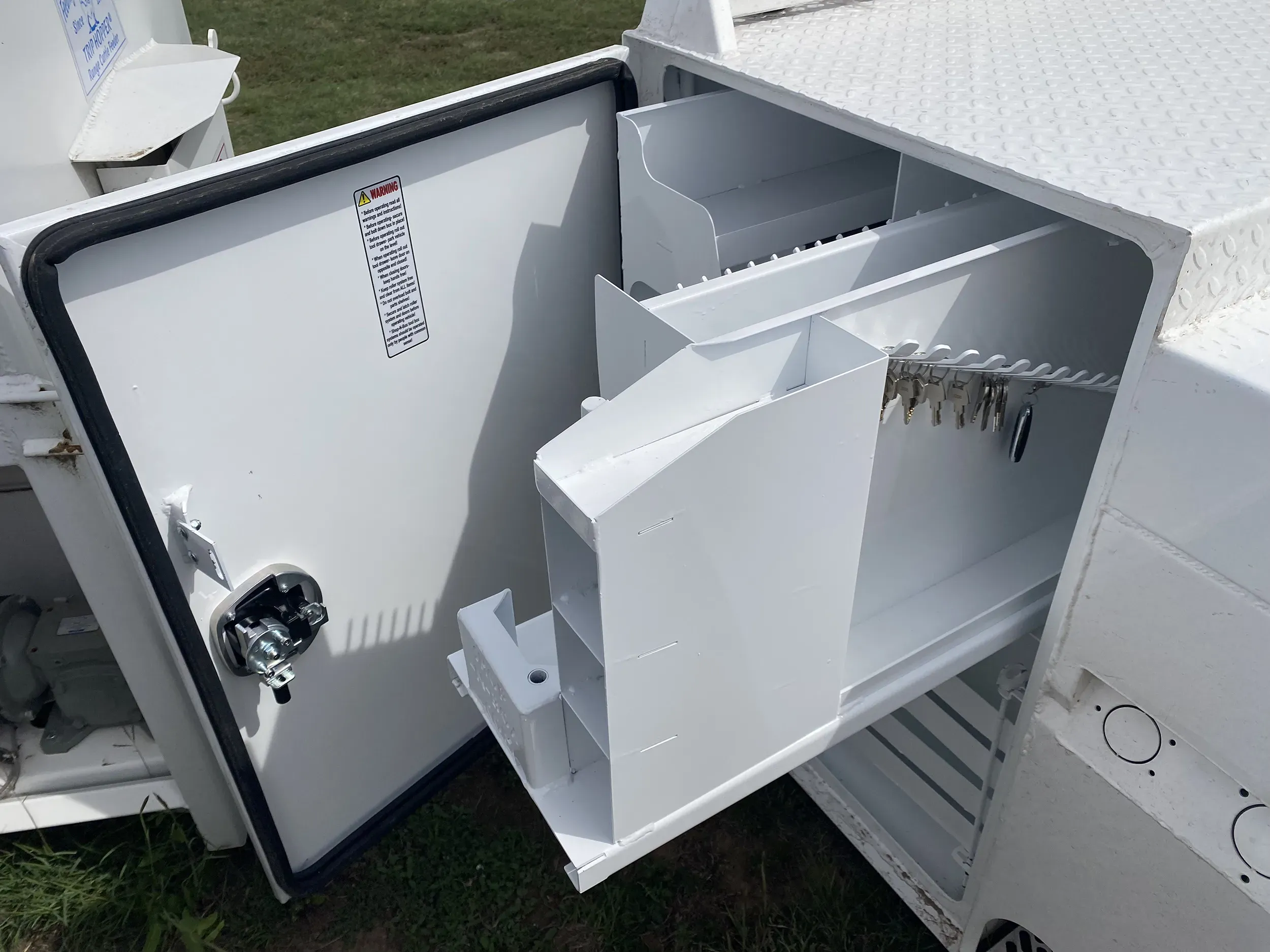 Shop-N-Box™ Legend Bed roll-out drawer extended showing smooth heavy-duty roller system