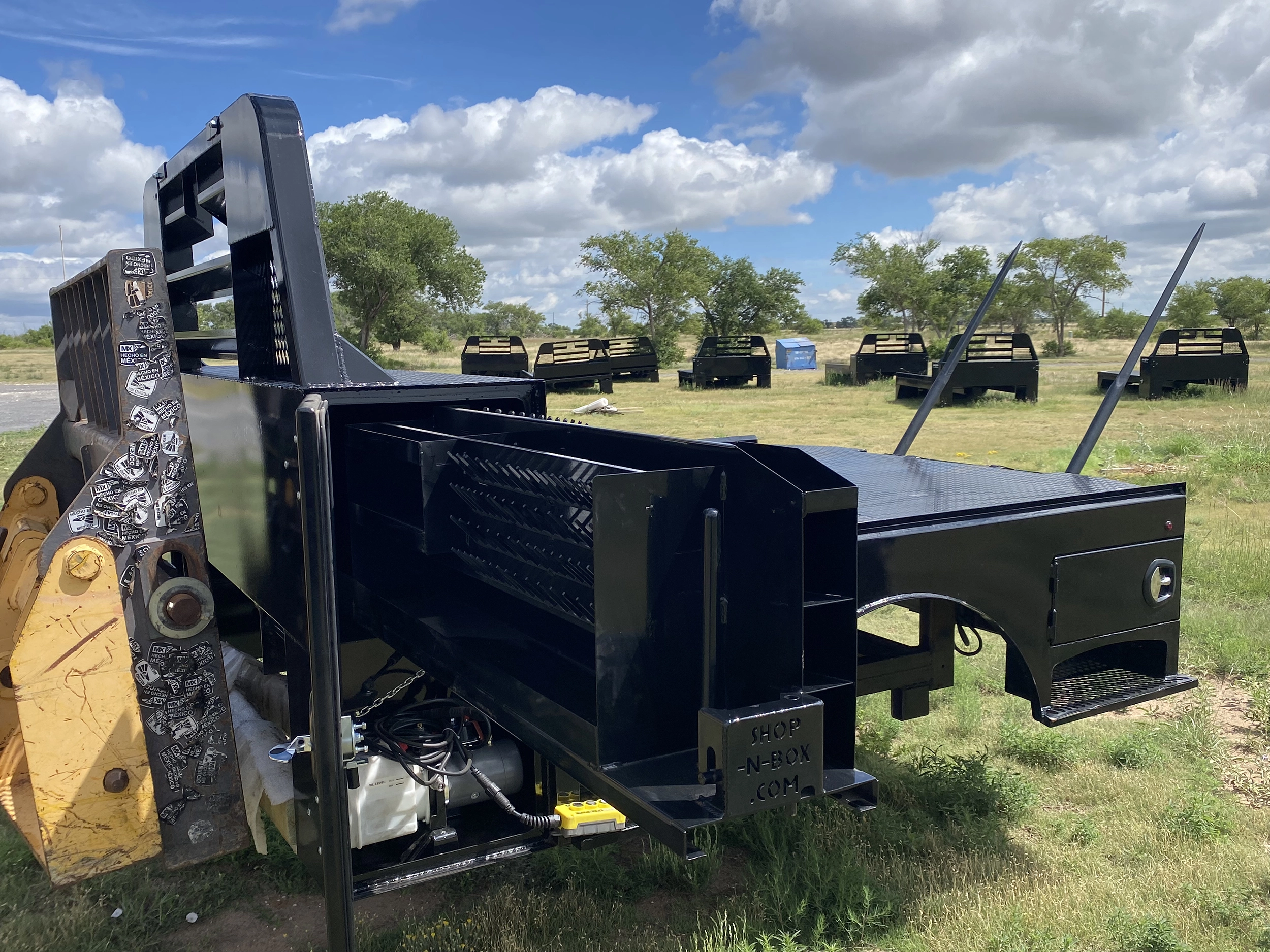Bale bed flatbed with integrated tool storage Shop-N-Box