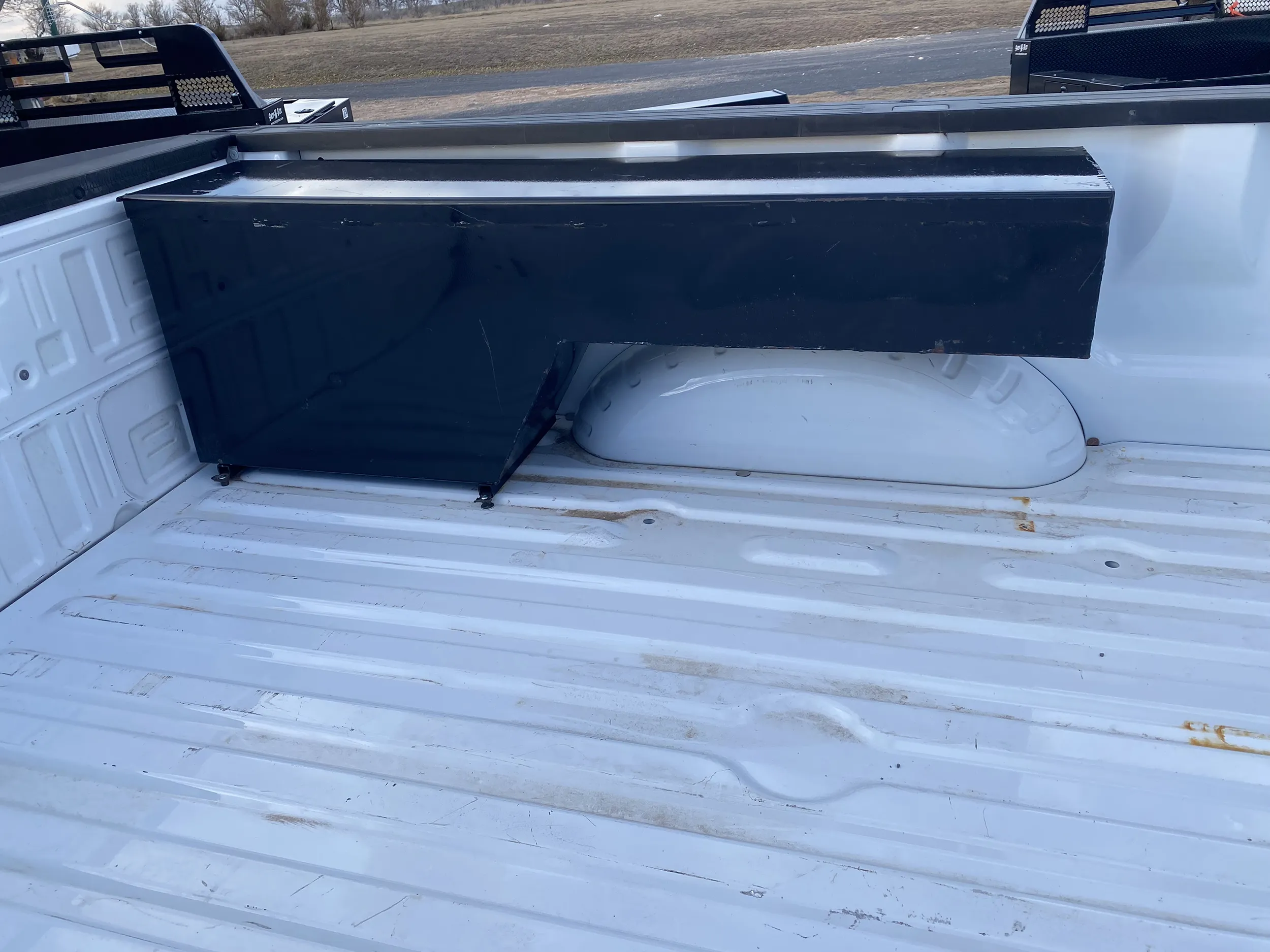 Fleetside box over wheel well below body line toolbox