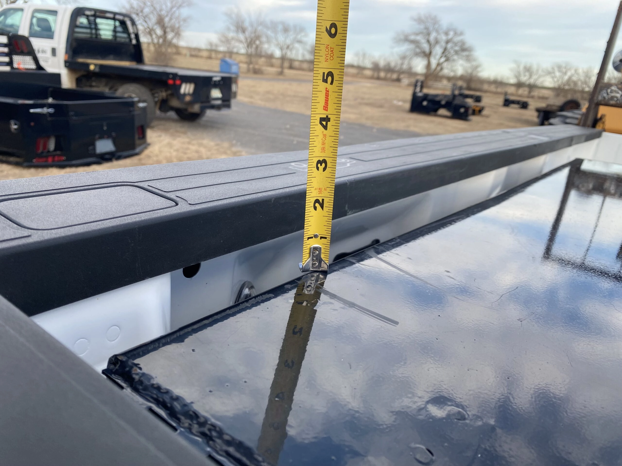 Fleetside toolbox below body line concealed storage