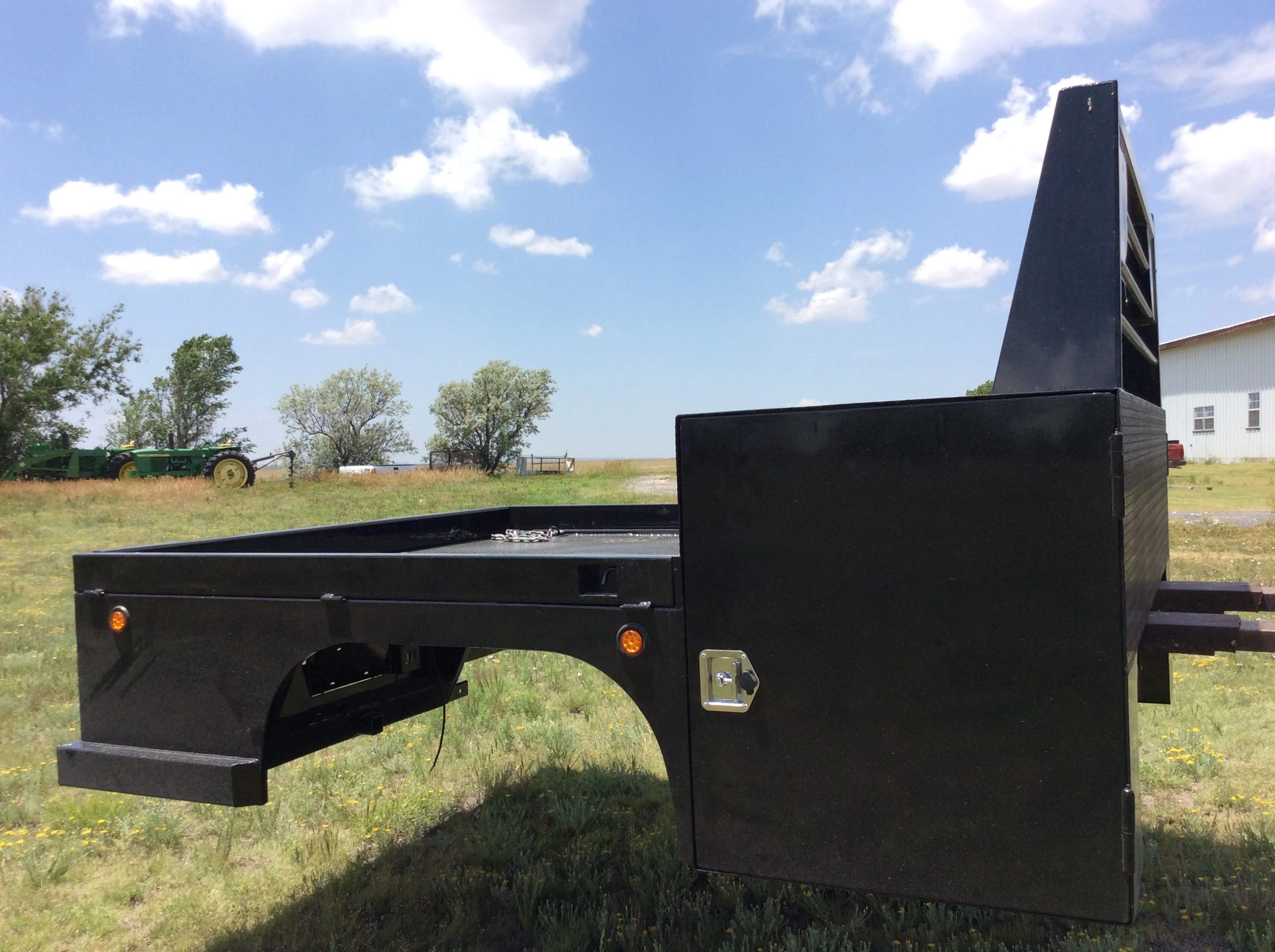 Shop-N-Box Gen 1 flatbed with fold-down rails and tie-downs