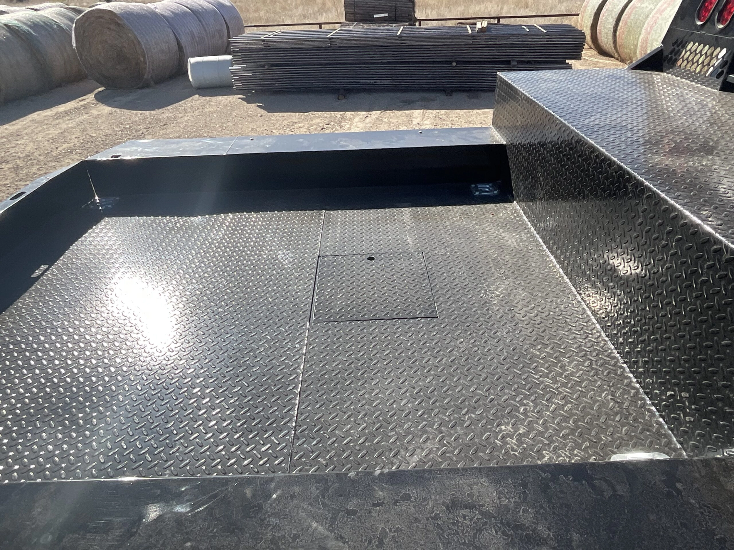 Shop-N-Box Gen 2 flatbed hauling deck with integrated toolboxes